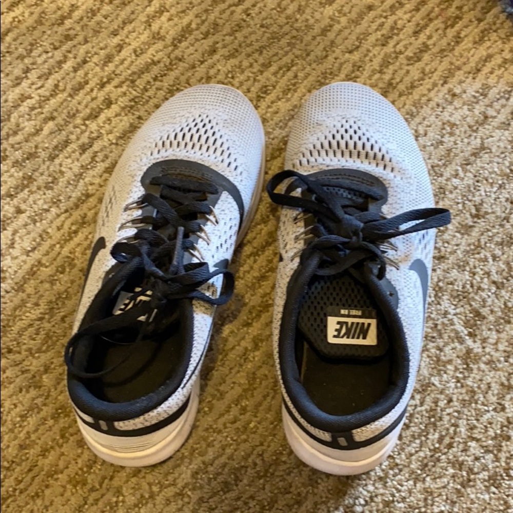 Grey and black nike sneakers